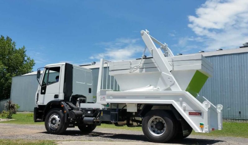 Volquetero y Roll Off lleno