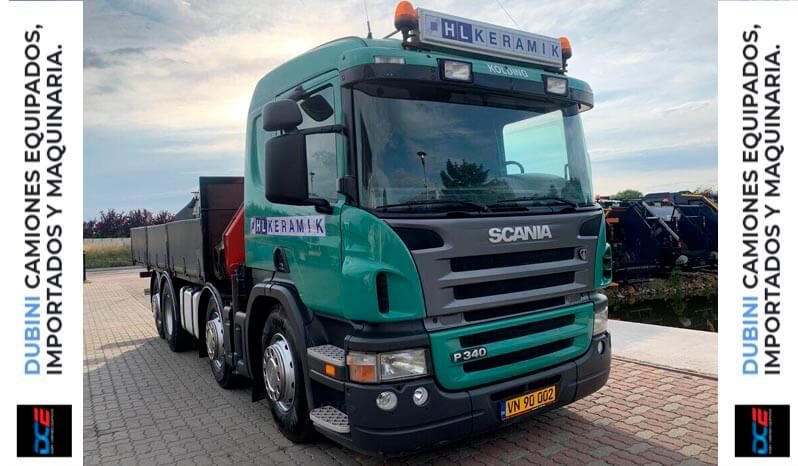SCANIA P340 8×2 + HIDROGRUA FASSI 150 A24 + CAJA 6,5mts lleno