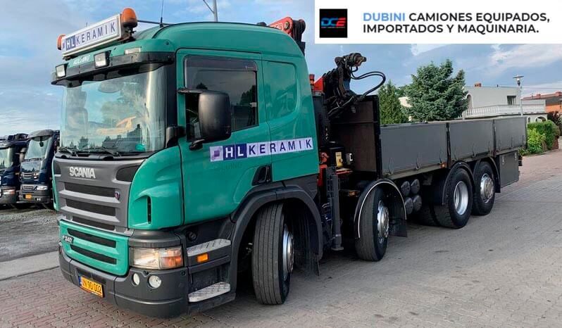 SCANIA P340 8×2 + HIDROGRUA FASSI 150 A24 + CAJA 6,5mts lleno